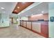 Hotel reception area with modern decor and wood accents at 3000 Maingate Ln # 113, Kissimmee, FL 34747