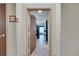 Inviting hotel room entry with wood door and tiled floor at 3000 Maingate Ln # 113, Kissimmee, FL 34747
