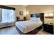 Cozy single bedroom with a comfortable bed and window at 3000 Maingate Ln # 113, Kissimmee, FL 34747
