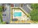 Overhead view of refreshing pool with surrounding patio at 3000 Maingate Ln # 113, Kissimmee, FL 34747