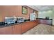 Well-equipped breakfast bar with self-serve pancake options at 3000 Maingate Ln # 113, Kissimmee, FL 34747