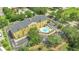 Aerial view of hotel with pool and parking at 3000 Maingate Ln # 113, Kissimmee, FL 34747