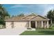 Two-story home with a two-car garage at 1771 Three Bars Rd, Kissimmee, FL 34744