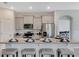 Kitchen with stainless steel appliances and an island with seating at 1771 Three Bars Rd, Kissimmee, FL 34744