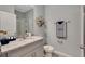 Small bathroom with granite countertop and shower at 1771 Three Bars Rd, Kissimmee, FL 34744