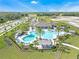 Community pool with a large deck and seating at 1771 Three Bars Rd, Kissimmee, FL 34744