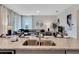 Modern kitchen features a large island with a double sink and granite countertops at 1771 Three Bars Rd, Kissimmee, FL 34744