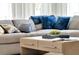 Relaxing living room with sectional sofa and coffee table at 1771 Three Bars Rd, Kissimmee, FL 34744