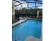 Inviting screened pool with a spa and fenced backyard at 2813 Bookmark Dr, Kissimmee, FL 34746