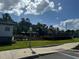 Community playground with play structures near pool and homes at 2813 Bookmark Dr, Kissimmee, FL 34746
