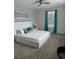 Spacious bedroom with a king-size bed and teal accents at 2813 Bookmark Dr, Kissimmee, FL 34746