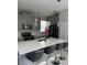 Modern kitchen with gray cabinets and white countertops at 2813 Bookmark Dr, Kissimmee, FL 34746