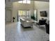 Spacious living area with large sectional sofa and pool view at 2813 Bookmark Dr, Kissimmee, FL 34746