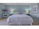 Bedroom with two double beds and calming decor at 5501 S Atlantic Ave # 307, New Smyrna Beach, FL 32169