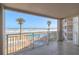 Spacious balcony overlooking the ocean, pool, and beach at 5501 S Atlantic Ave # 307, New Smyrna Beach, FL 32169