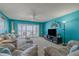 Bright living room boasts ocean views and ample seating at 5501 S Atlantic Ave # 307, New Smyrna Beach, FL 32169