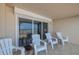 Relaxing balcony with ocean view and comfortable seating at 5501 S Atlantic Ave # 307, New Smyrna Beach, FL 32169