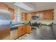 Galley-style kitchen with stainless steel appliances at 5501 S Atlantic Ave # 307, New Smyrna Beach, FL 32169