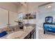 Guest bathroom with double vanity and granite countertop at 1777 Three Bars Rd, Kissimmee, FL 34744