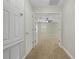 Bright hallway with carpet and access to bedrooms at 12730 Oulton Cir, Orlando, FL 32832