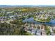 Aerial view of a beautiful neighborhood with a lake at 12730 Oulton Cir, Orlando, FL 32832