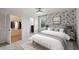 Main bedroom with a queen bed and walk-in closet at 1546 Water Elm Ct, Orlando, FL 32825