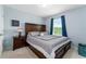 Bedroom with dark wood furniture and window blinds at 5443 Carrara Ct, St Cloud, FL 34771