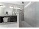 Large walk-in shower with double vanity at 5443 Carrara Ct, St Cloud, FL 34771