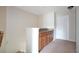 Hallway with built-in cabinets and granite top at 8948 Hildreth Ave, Orlando, FL 32832