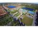 Expansive community view with pools and tennis court at 8954 California Palm Rd, Kissimmee, FL 34747