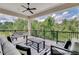 Outdoor patio with foosball table and comfortable seating at 1110 Watson Ct, Reunion, FL 34747