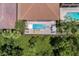 Aerial view of property showing pool and patio at 1110 Watson Ct, Reunion, FL 34747