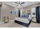 Serene bedroom with a king-size bed and stylish decor at 1110 Watson Ct, Reunion, FL 34747