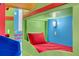 Built in bunk beds in a bedroom with colorful decor at 1110 Watson Ct, Reunion, FL 34747