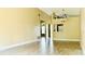 Spacious living room with tile floors and a view of kitchen at 125 Grand Junction Blvd, Orlando, FL 32835
