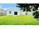 Spacious backyard with grassy lawn and wooden fence at 125 Grand Junction Blvd, Orlando, FL 32835