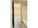 Bedroom with tile floor and adjacent bathroom at 125 Grand Junction Blvd, Orlando, FL 32835