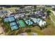 Aerial view showing community pool, tennis courts, and clubhouse at 2160 Antilles Club Dr, Kissimmee, FL 34747