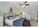 Main bedroom with ample space and an ensuite bathroom at 2160 Antilles Club Dr, Kissimmee, FL 34747