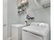 Laundry room with washer, dryer, and ample shelving at 2160 Antilles Club Dr, Kissimmee, FL 34747