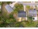 Aerial view showing house, yard, and neighboring properties at 3703 Wade Rd, Orlando, FL 32808