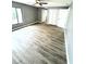 Bright and spacious bedroom with wood-look floors at 4229 S Lake Orlando Pkwy # 133, Orlando, FL 32808