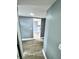 Hallway with gray walls and wood-look flooring at 4229 S Lake Orlando Pkwy # 133, Orlando, FL 32808