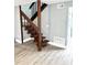 Indoor staircase with wood railing and steps at 4229 S Lake Orlando Pkwy # 133, Orlando, FL 32808