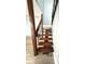 Indoor staircase with wood railing and steps at 4229 S Lake Orlando Pkwy # 133, Orlando, FL 32808