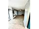 Spacious living room with fireplace and wood-look floors at 4229 S Lake Orlando Pkwy # 133, Orlando, FL 32808