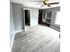 Spacious bedroom with wood-look floors and large closet at 4229 S Lake Orlando Pkwy # 133, Orlando, FL 32808