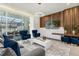 Bright living room with comfortable seating and access to backyard at 4306 Lana Ave, Davenport, FL 33897