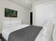 Bedroom with a comfortable bed, dresser, and sliding door closet at 4306 Lana Ave, Davenport, FL 33897