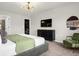Bright main bedroom with a king-size bed and an ensuite bathroom at 4306 Lana Ave, Davenport, FL 33897